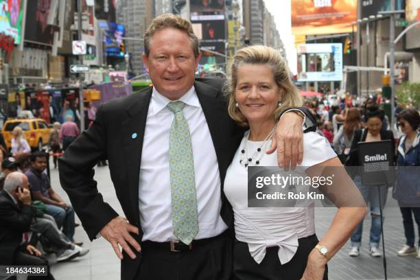 Fortescue Metals Group chairman Andrew 'Twiggy' Forrest poses with his wife Nicola at Times Square on September 25, 2013 in New York City.