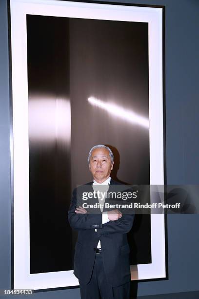 Artist Hiroshi Sugimoto, standing front of his work, attends Boucheron Hosts Hiroshi Sugimoto Exhibition Celebration at Place Vendome Boucheron shop...
