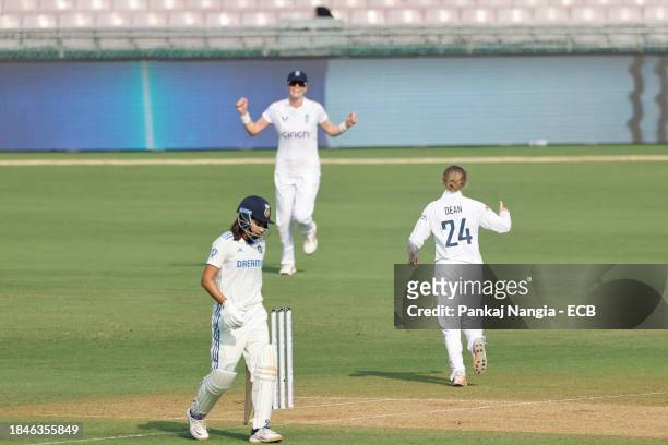 Charlie Dean of England celebrates the wicket of Yastika Bhatia of India during day 1 of the Test match between India Women and England Women at DY...