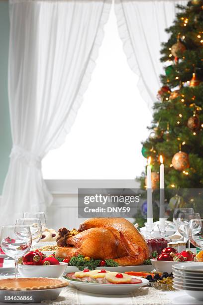 christmas dinner - christmas table turkey stock pictures, royalty-free photos & images