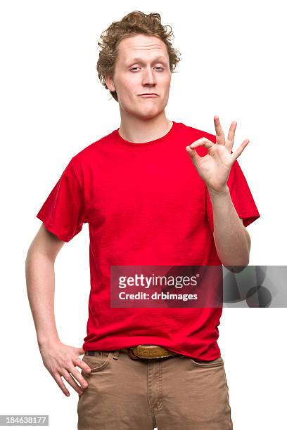 young man gestures okay hand sign - smug stock pictures, royalty-free photos & images