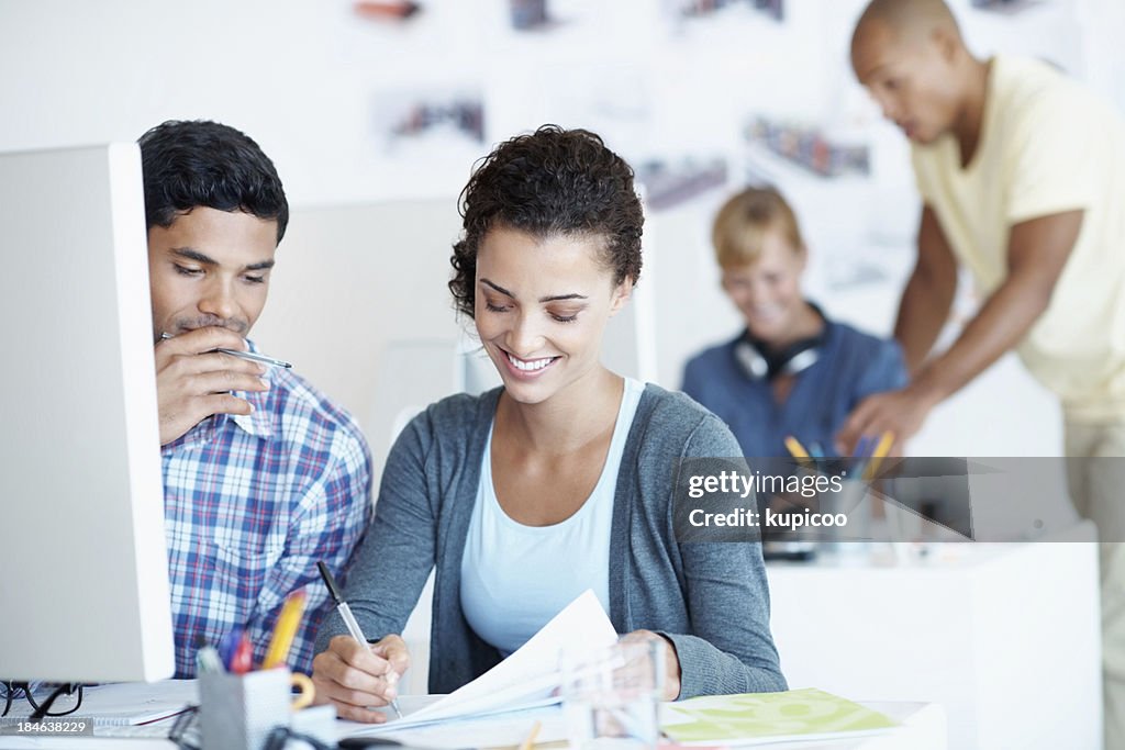 Mixed race people working together