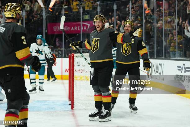 Jack Eichel and Mark Stone of the Vegas Golden Knights react after a goal by Brayden McNabb during the third period against the San Jose Sharks at...
