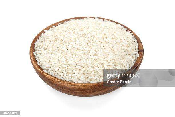 rice in a wooden bowl - bowl of rice stockfoto's en -beelden