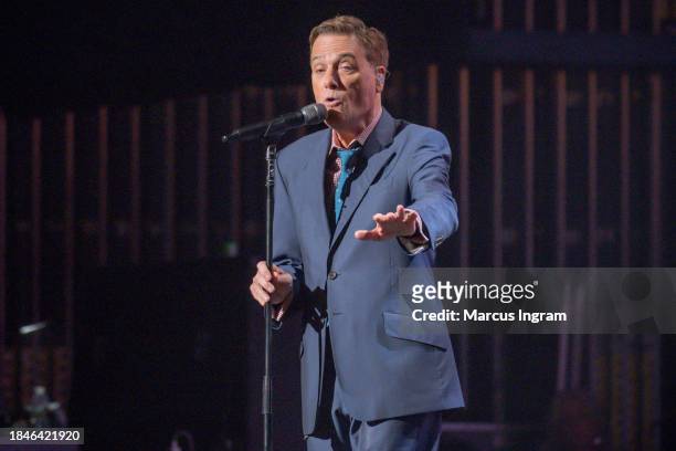 Michael W. Smith performs on stage during the Christmas Live concert at Smart Financial Centre on December 10, 2023 in Sugar Land, Texas.