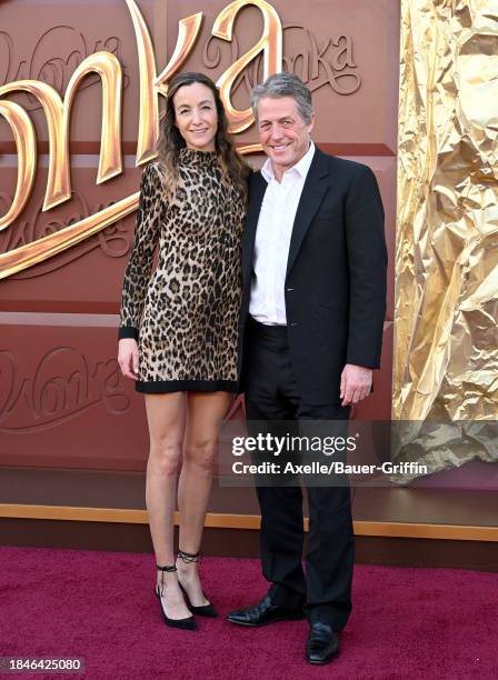 Anna Elisabet Eberstein and Hugh Grant attend the Los Angeles Premiere of Warner Bros. "Wonka" at Regency Village Theatre on December 10, 2023 in Los...