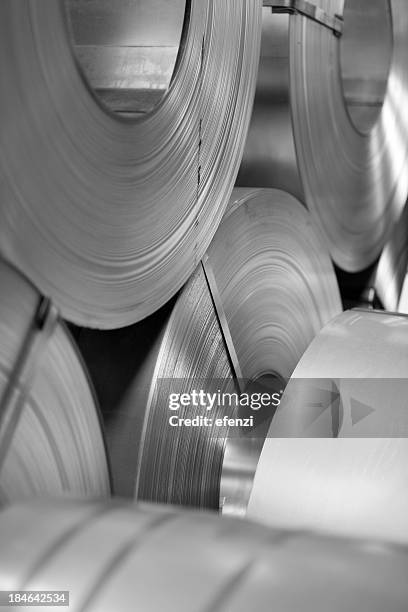 rolls of steel sheet - iron roll stockfoto's en -beelden