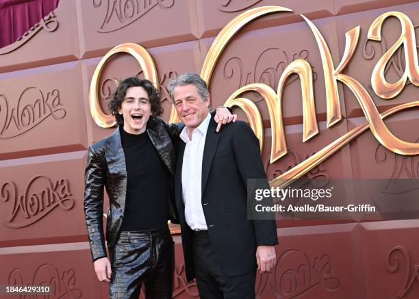 Timothée Chalamet and Hugh Grant attend the Los Angeles Premiere of Warner Bros. "Wonka" at Regency Village Theatre on December 10, 2023 in Los...