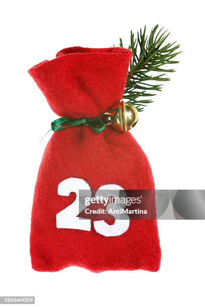 red christmas bag for advent calendar isolated on white - adventkalender stock pictures, royalty-free photos & images