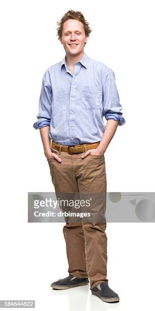 young man with hands in pockets - powder blue shirt stock pictures, royalty-free photos & images