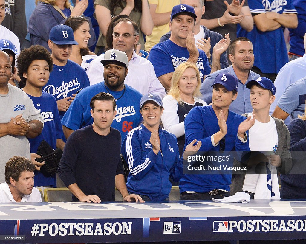 Dodgers Robe Ice Cube, Robe Lowe and Matthew Edward Lowe attend Game Three of the ...