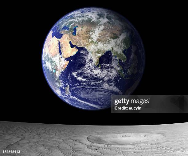 view of rising earth from the moon's surface - ozone layer stock pictures, royalty-free photos & images