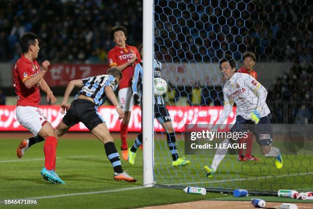 Yoshito Okubo of Kawasaki Frontale heads to score the team's second goal during the J.League J1 first stage match between Kawasaki Frontale and...