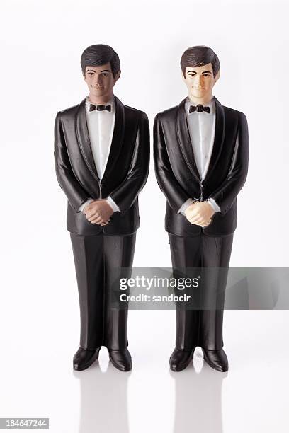 wedding cake topper - two grooms. - wedding cake figurine stock pictures, royalty-free photos & images