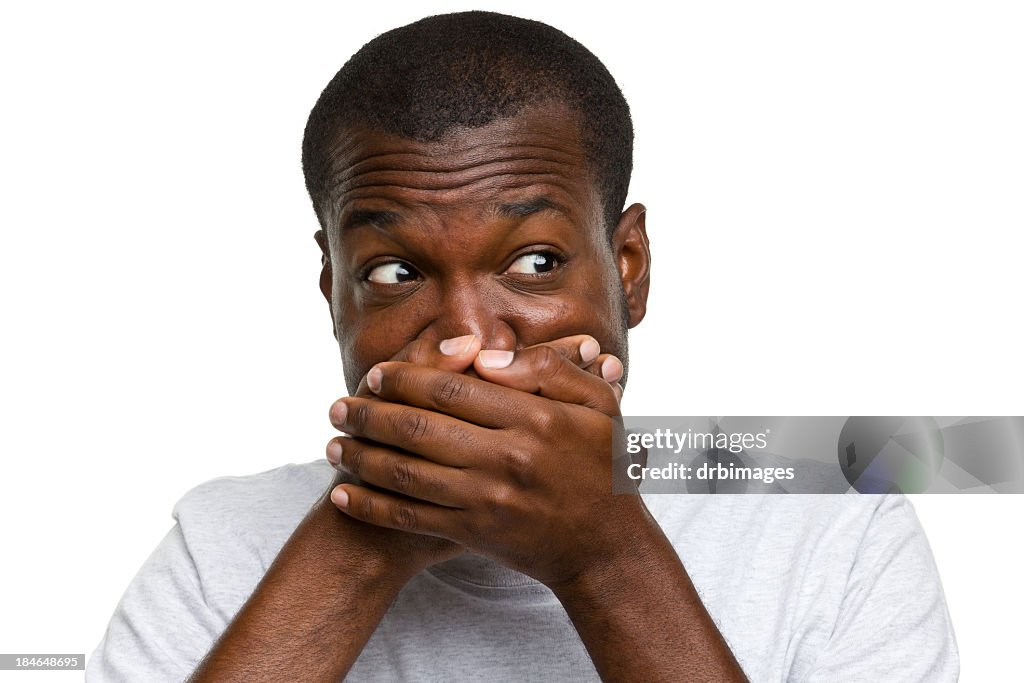 Surprised Man Covers Mouth