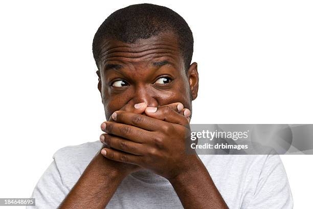 surprised man covers mouth - gasping stock pictures, royalty-free photos & images