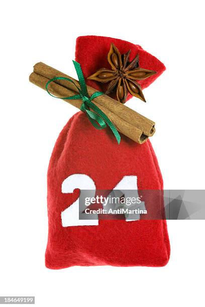 red christmas bag for advent calendar isolated on white - adventkalender stock pictures, royalty-free photos & images