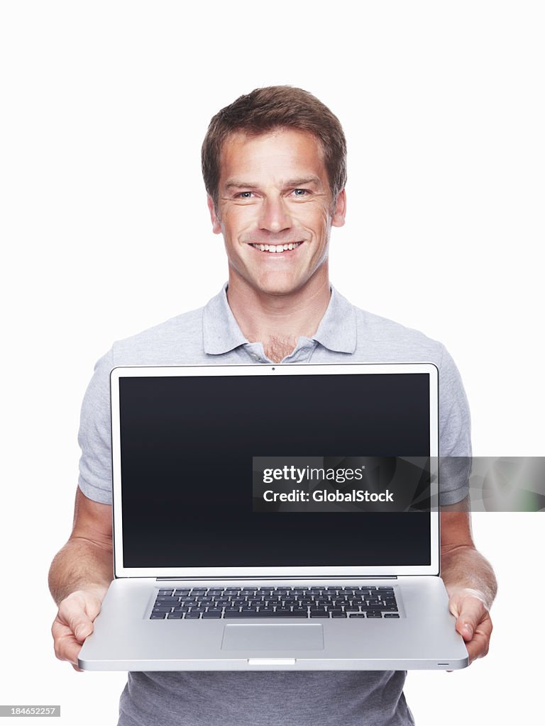 Man displaying laptop