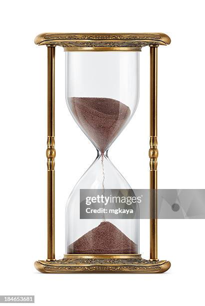 ancient looking hourglass - old clock stock pictures, royalty-free photos & images