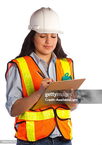 construction woman orange vest - hard hat white background stock pictures, royalty-free photos & images