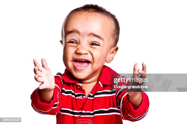 toddler boy laughing and clapping - funny face baby stock pictures, royalty-free photos & images