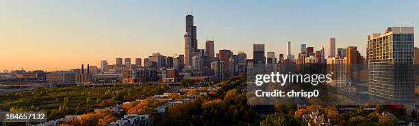 an aerial panoramic view of the city of chicago at sunset - aon center chicago stock pictures, royalty-free photos & images