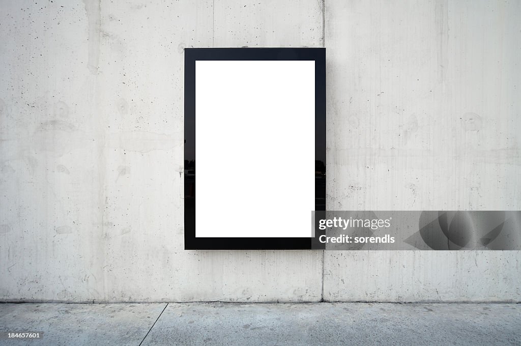 Blank billboard on wall.