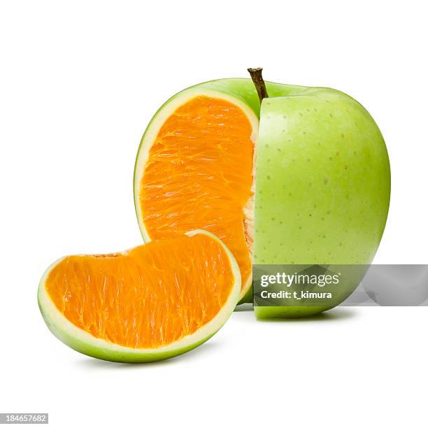 apple orange - green apple slices stock pictures, royalty-free photos & images