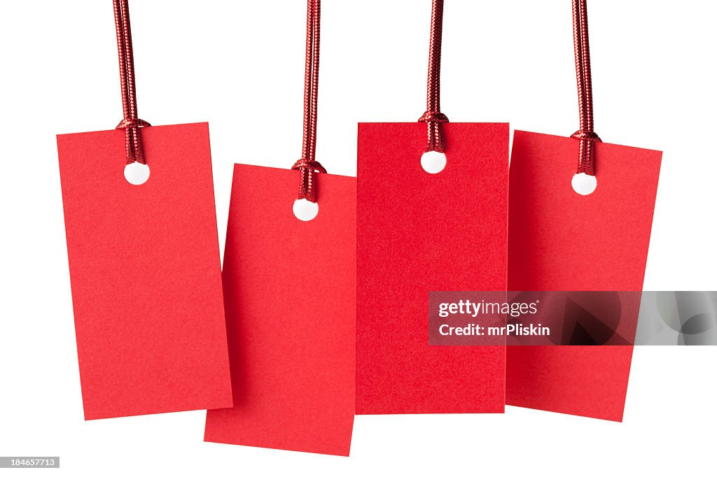 Four blank red price labels