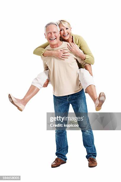 mature couple young at heart - old person on white background stockfoto's en -beelden