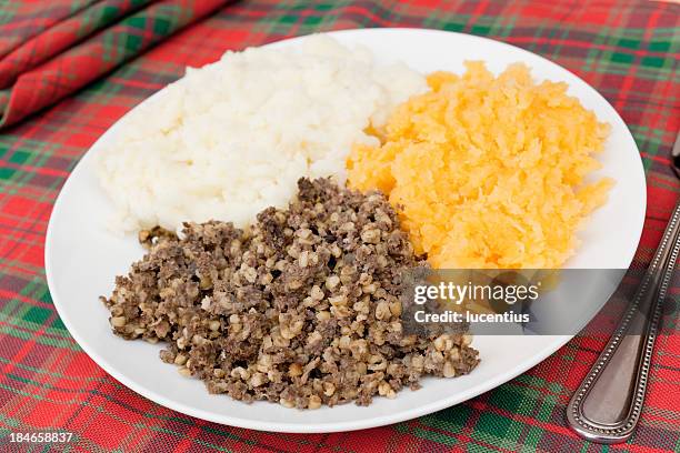 traditional scottish meal of haggis, mash and turnips - haggis stock pictures, royalty-free photos & images