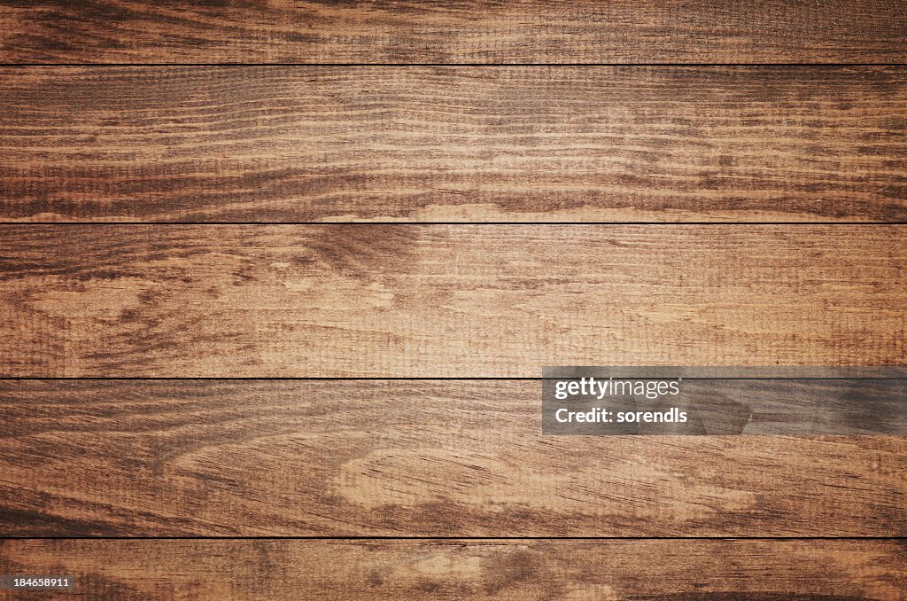 Overhead view of old dark brown wooden table