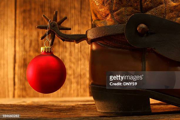 cowboy christmas - boot spur stock pictures, royalty-free photos & images
