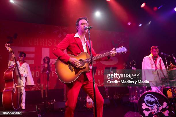 Josue Veneno of Rebel Cats, singer Leonardo de Lozanne and Vince Monster of rebel Cats perform during the Show `A Christmas Day With Elvis´ at...