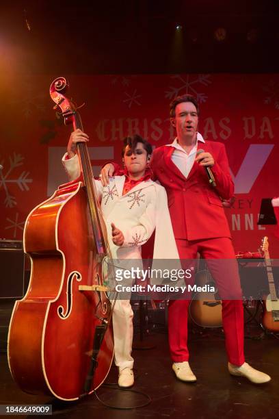 Josue Veneno of Rebel Cats and singer Leonardo de Lozanne perform during the Show `A Christmas Day With Elvis´ at Lunario on December 10, 2023 in...