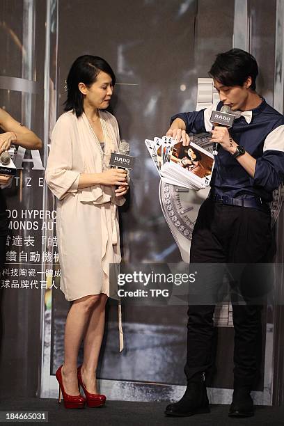 Singer Ren'e Liu and Yen-j attend opening ceremony at Taipei 101 on Monday Oct 14,2013 in Taipei,China.