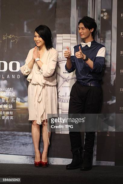 Singer Ren'e Liu and Yen-j attend opening ceremony at Taipei 101 on Monday Oct 14,2013 in Taipei,China.