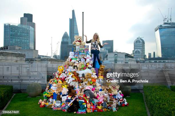 Denise Van Outen launches the 2013 Argos Toy Exchange to help raise funds for children's charity Barnardo's at Coq d'Argent on October 15, 2013 in...