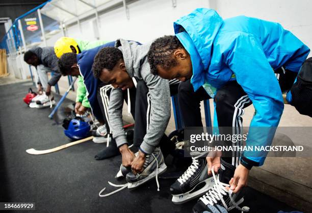 Somali players prepare to take part in the Somali national Bandy team's training session on September 24, 2013 in the city of Borlaenge, Sweden....