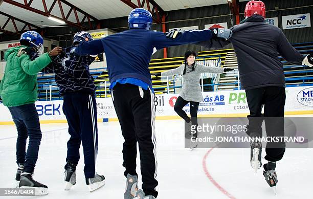 Somali players work on their ice balance during the Somali national Bandy team's training session on September 24, 2013 in the city of Borlaenge,...
