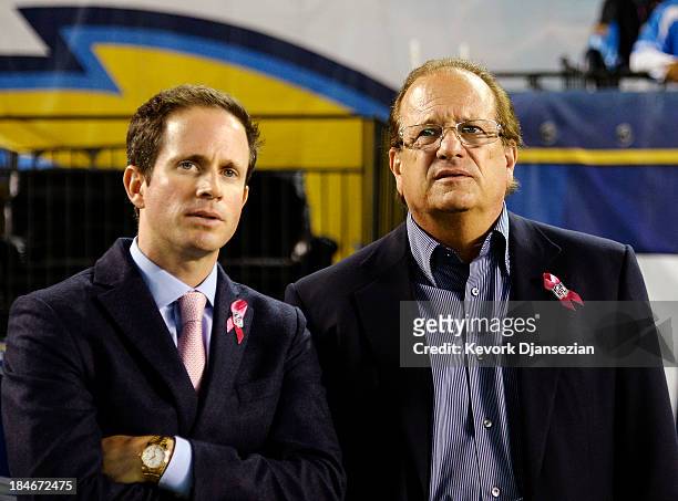 San Diego Chargers football team owner Dean Spanos and his son John Spanos follow the action against Indianapolis Colts at Qualcomm Stadium October...