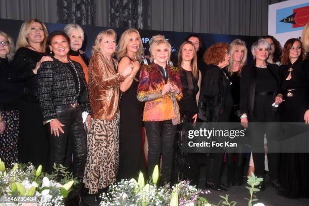 Natacha Amal, Jeanne d’Hautesserre, a guest, Fabienne Amiach, Sophie Darel, Andrea Ferreol, Lucie Russo, Evelyne Dress and guests attend the...