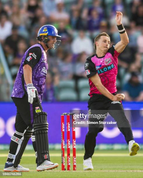 Tom Curran of the Sixers bowls during the BBL match between Hobart Hurricanes and Sydney Sixers at University of Tasmania Stadium, on December 11 in...