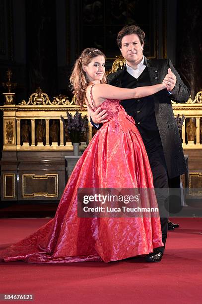 Francis Fulton- Smith and Jeanette Biedermann pose on stage after the 'Everyman' Photo Rehearsal at Berliner Dom on October 15, 2013 in Berlin,...