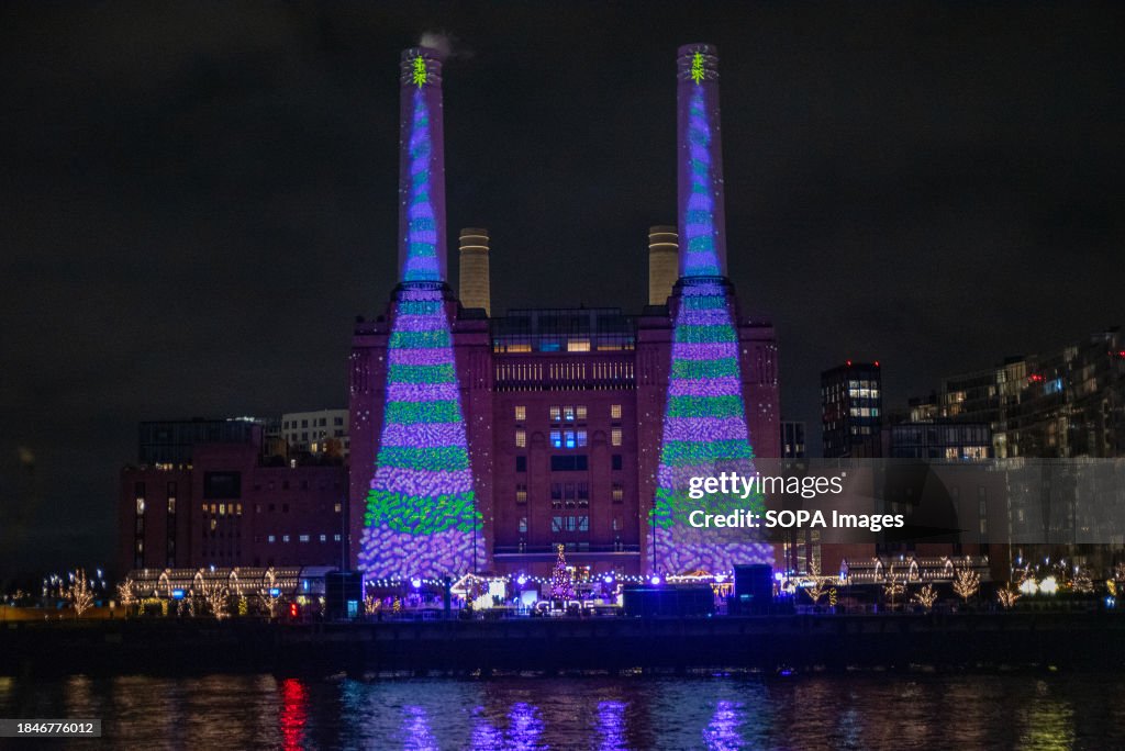 British artist David Hockney projects two animated Christmas...