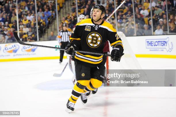 Shawn Thornton of the Boston Bruins looks up at the loose puck against the Colorado Avalanche at the TD Garden on October 10, 2013 in Boston,...