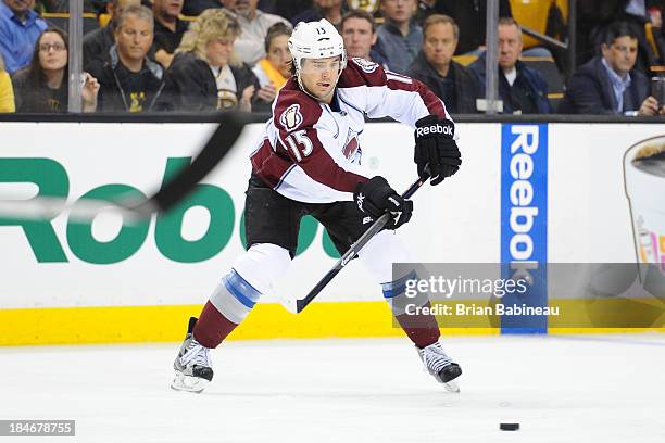Parenteau of the Colorado Avalanche passes the puck against the Boston Bruins at the TD Garden on October 10, 2013 in Boston, Massachusetts.