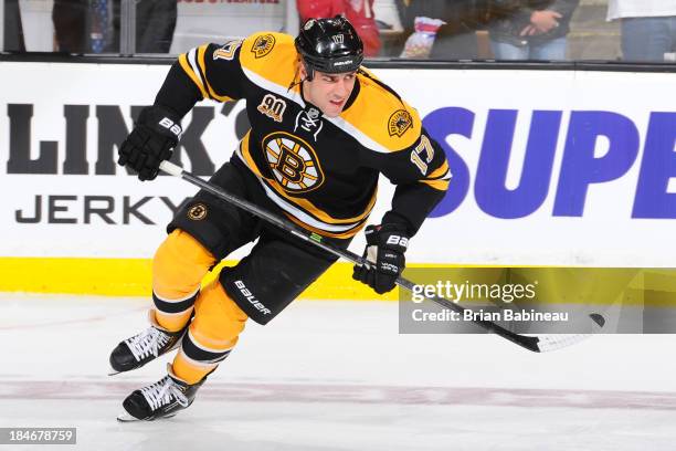 Milan Lucic of the Boston Bruins skates during warm ups prior to the game against the Colorado Avalanche at the TD Garden on October 10, 2013 in...