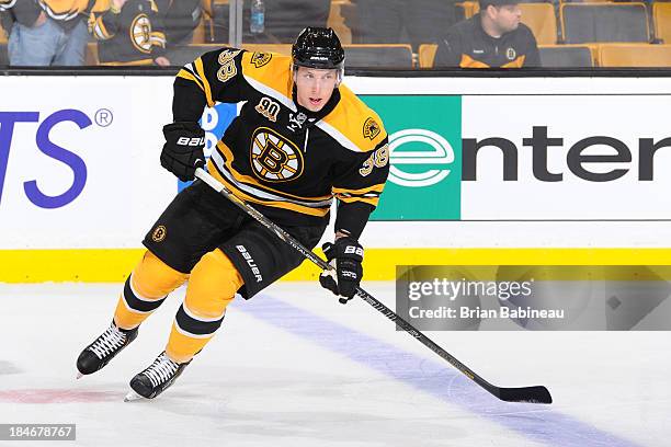 Jordan Caron of the Boston Bruins skates during warm ups prior to the game against the Colorado Avalanche at the TD Garden on October 10, 2013 in...