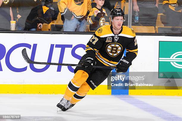 Dougie Hamilton of the Boston Bruins skates during warm ups prior to the game against the Colorado Avalanche at the TD Garden on October 10, 2013 in...